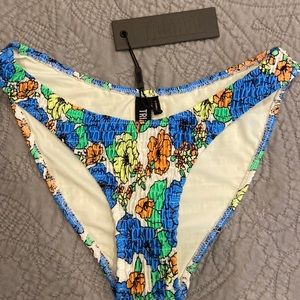 Triangl swim bottoms. Never worn, just sitting in my drawer.